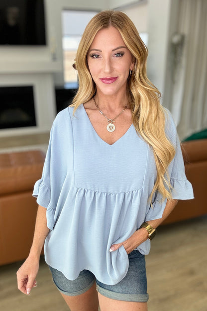 Airflow Peplum Ruffle Sleeve Top in Chambray