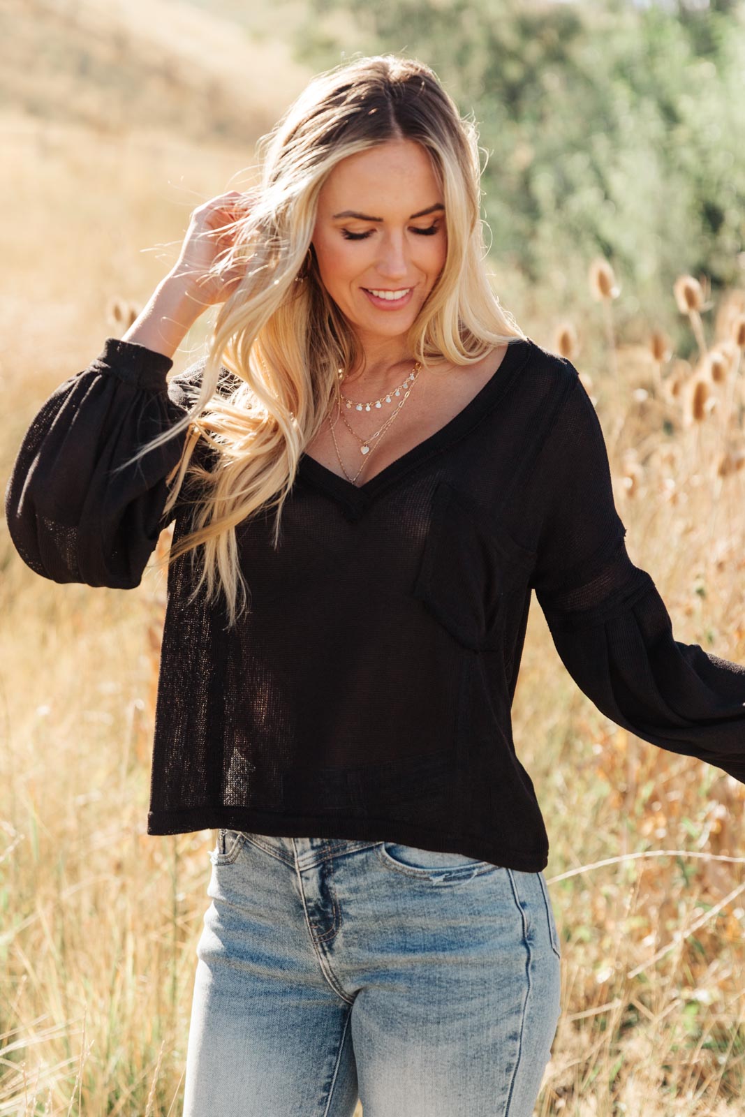 Bellissimo Draped V-Neck Sweater in Black